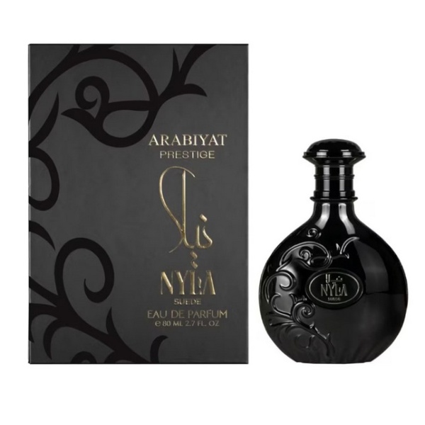 Nyla Suede by Arabiyat Prestige – unisex fragrance with coconut, praline, caramel, leather, sandalwood, ambergris, and musk.